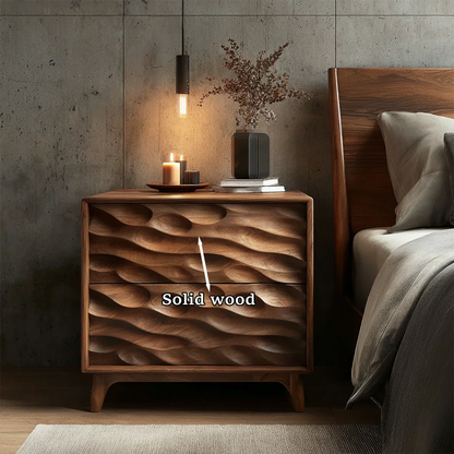 Artistic bedside nightstand showcasing bold sculpted drawer detail and warm walnut tone finish