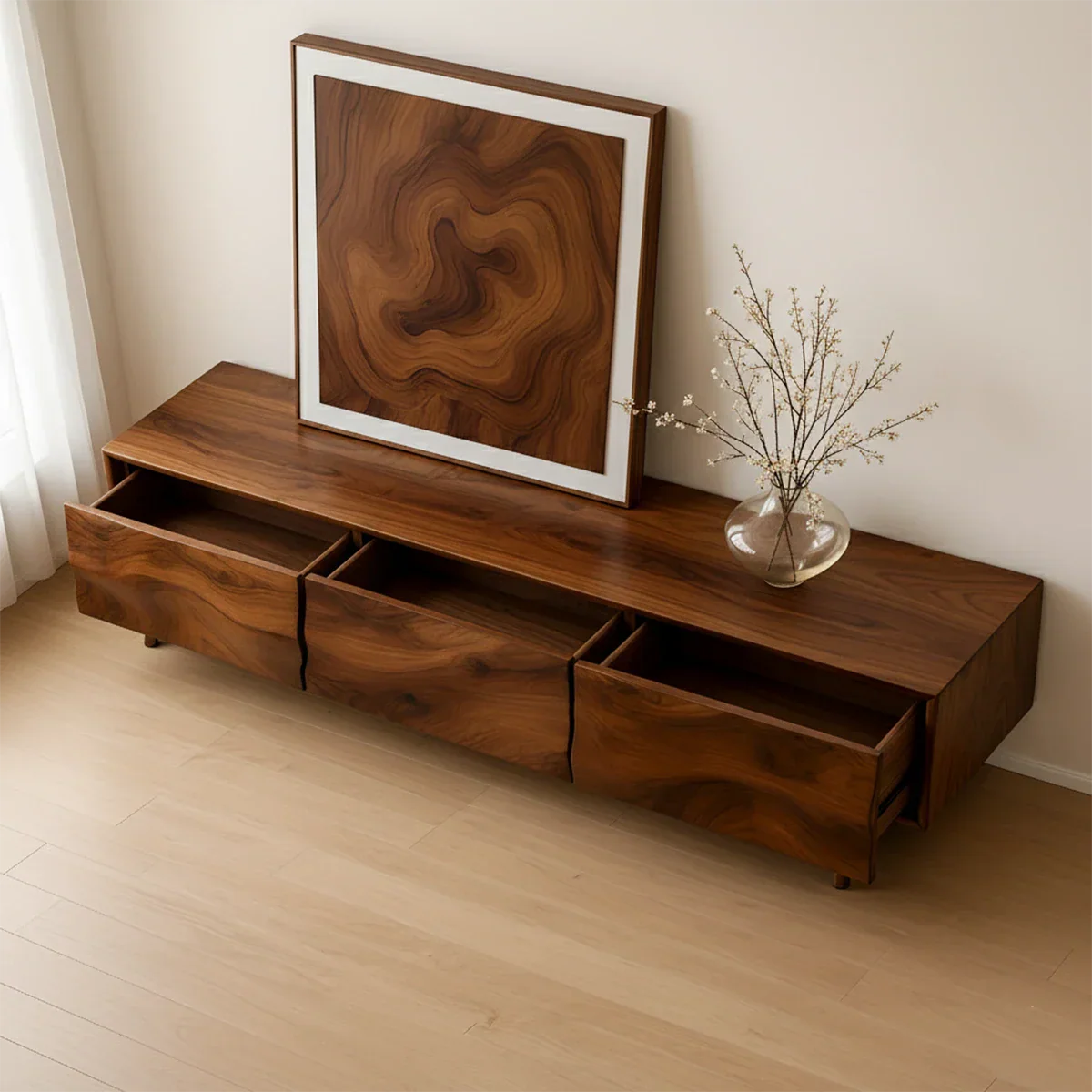 Brown finish TV stand with rich grain pattern and low modern design in a bright neutral space