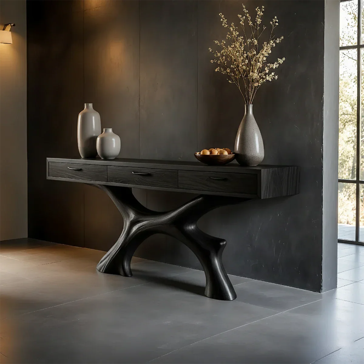 Refined console table with sculptural base and built in drawers for contemporary interiors