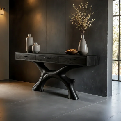 Refined console table with sculptural base and built in drawers for contemporary interiors
