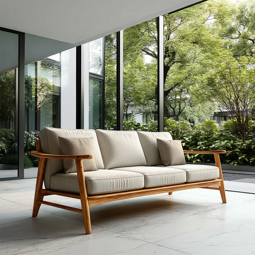 Modern 3 seat sofa with soft fabric cushions and natural wood frame in bright minimalist living space
