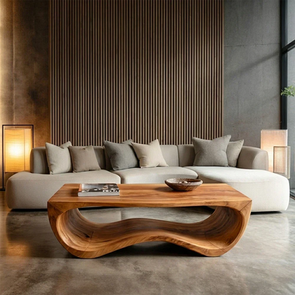Modern living room with a gray sectional sofa and a wooden coffee table.