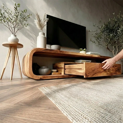 This modern media console features a smooth curved form with natural wood grain and hidden storage