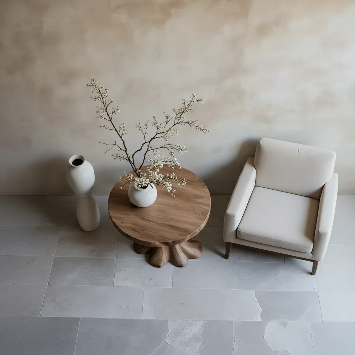 Contemporary accent table in walnut color finish with sculptural base and smooth rounded edges