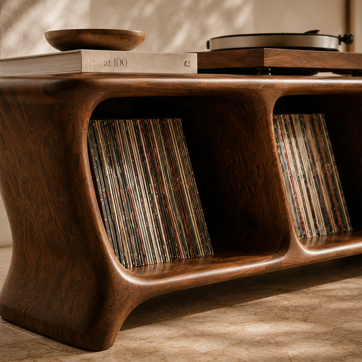 Sculptural record player cabinet with integrated vinyl storage and display surface
