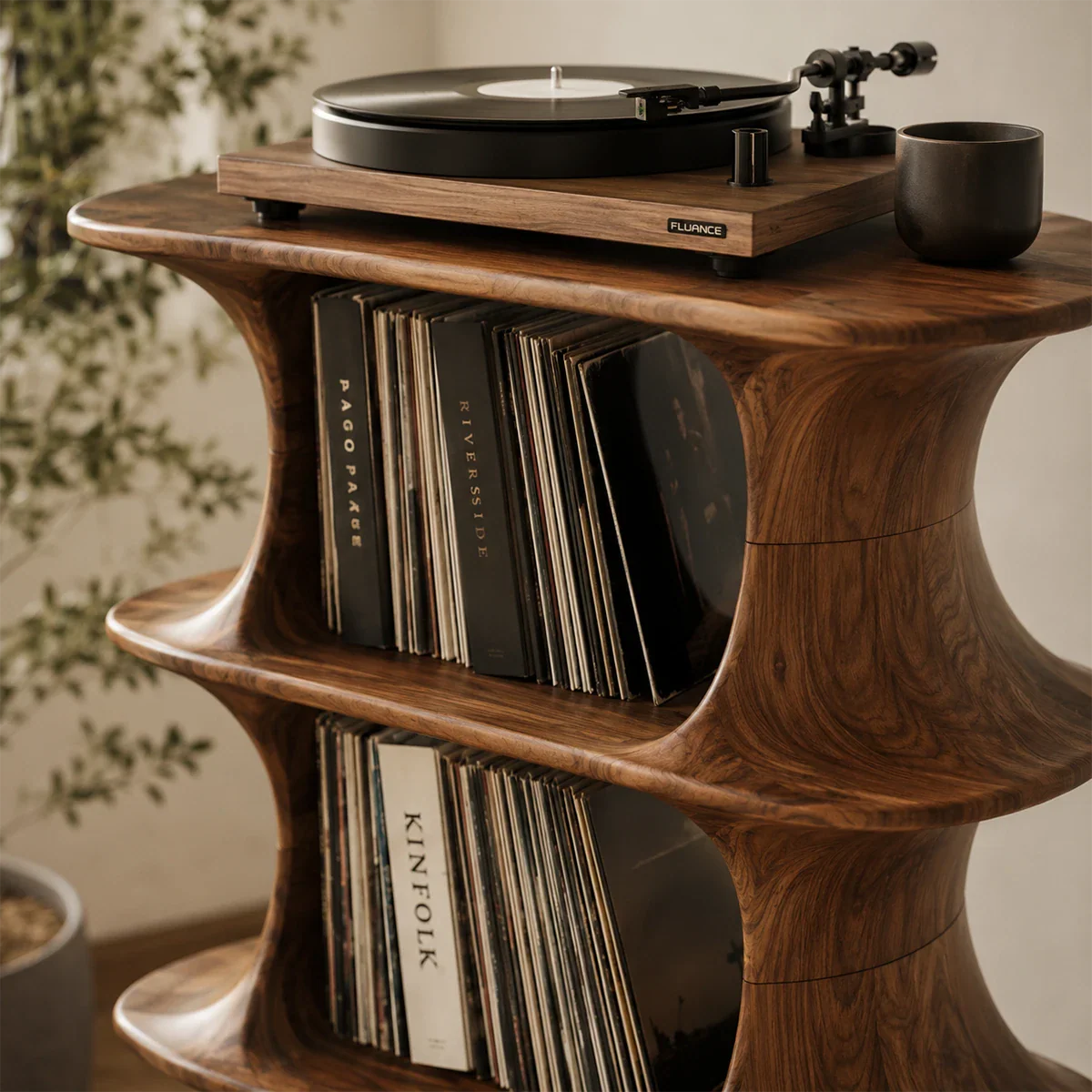Sculptural record player cabinet with vertical storage for organized vinyl collections