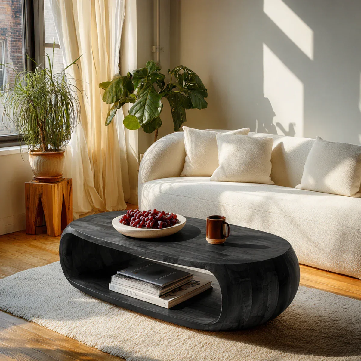 Minimalist coffee table with oval design and open compartment for clutter-free spaces