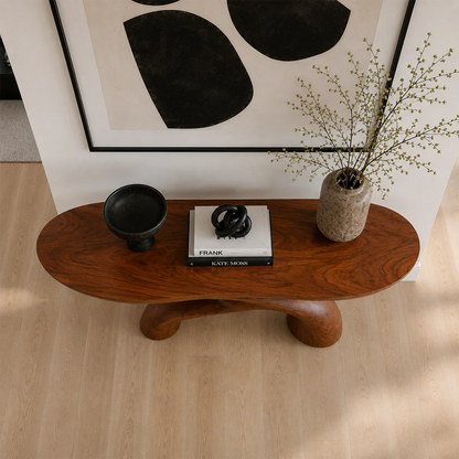 Organic modern console featuring a handcrafted sculptural base and clean top surface